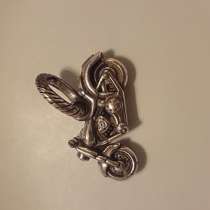 Brighton motorcycle charm. Clear stone for headlights and red stone for tail.